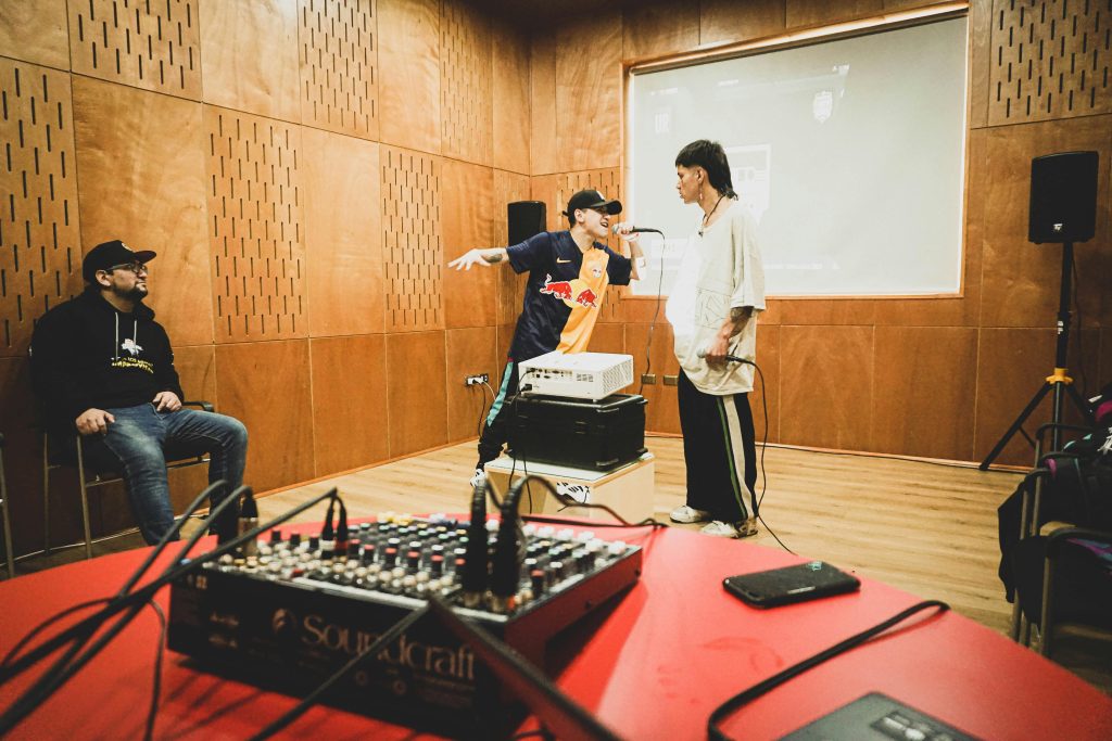 independent artist collaborating in the studio.